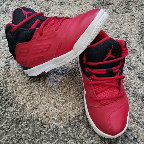 boys red and black jordans